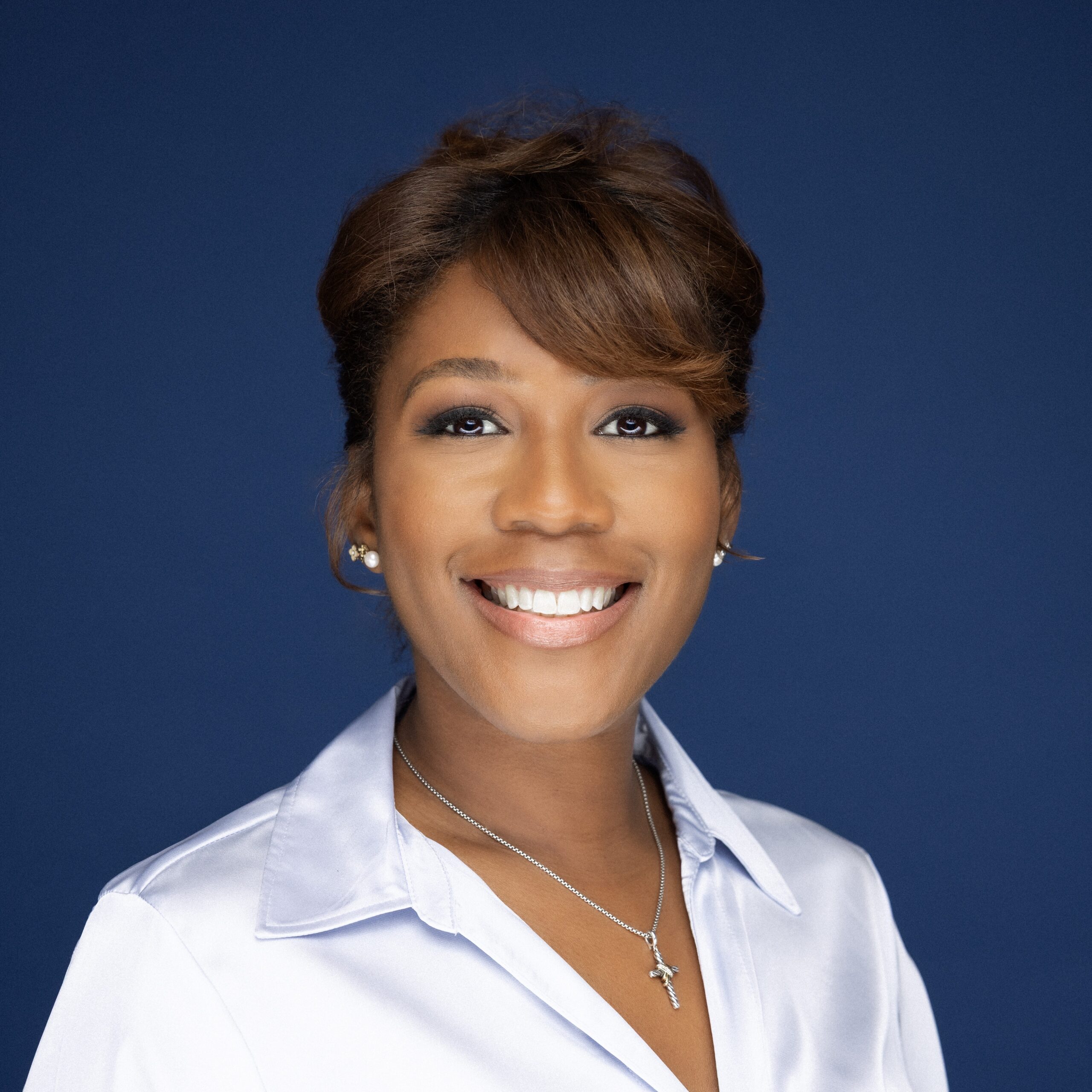 Portrait of Andrea Henry, CEO of ANH Consulting, appearing confident. Speaker at the Educators Assemble™ Conference, leading a classroom simulation session.