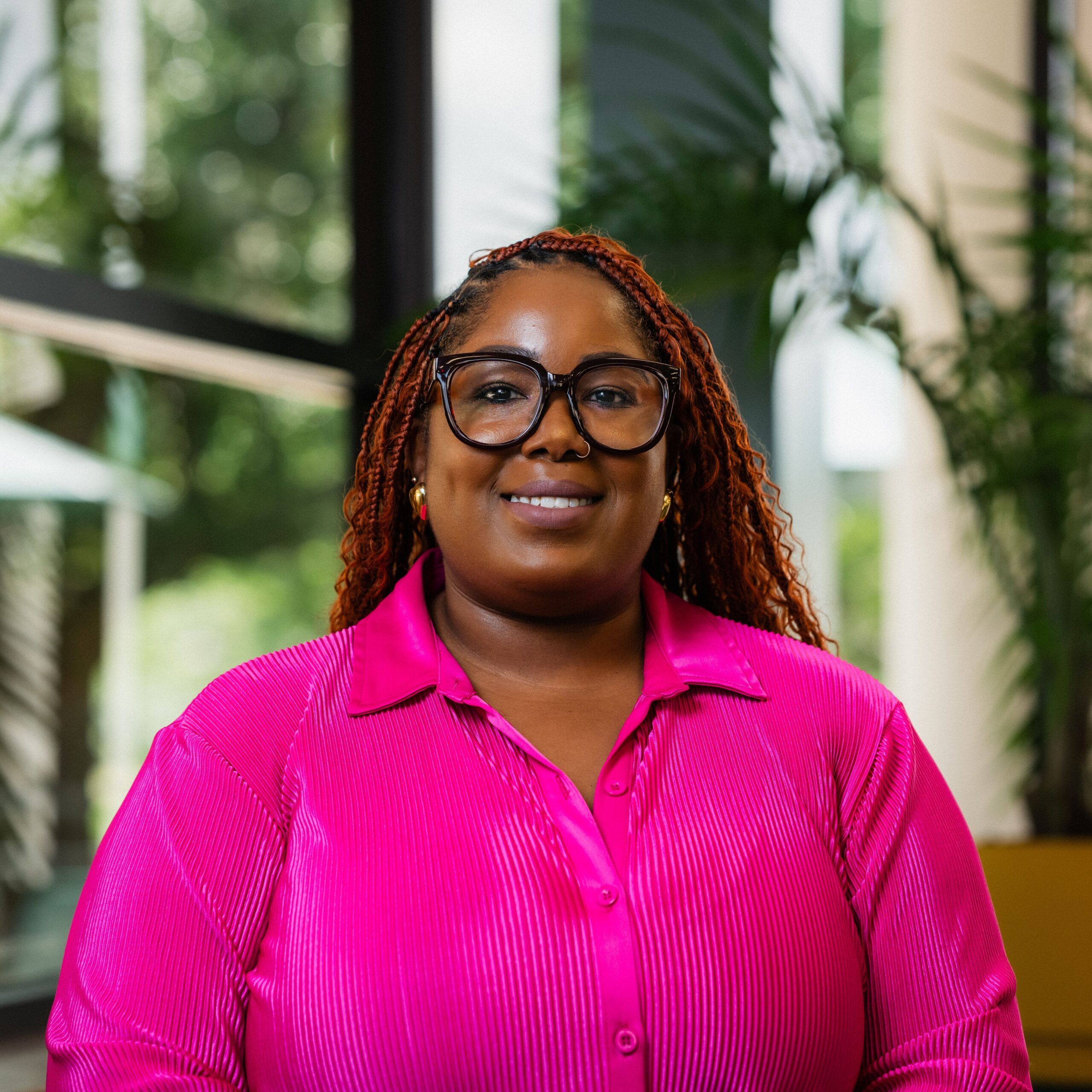 Portrait of Niki Da’Jon, MBA, Founder and CEO of Career Training Group, beaming. Speaker at the Educators Assemble™ Conference.